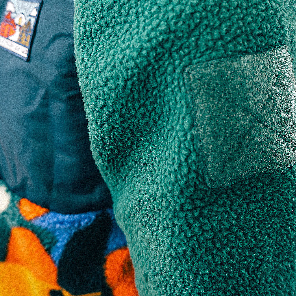 Out There Hooded Recycled Sherpa Fleece Jacket (Banana Camo Forest/Orange)