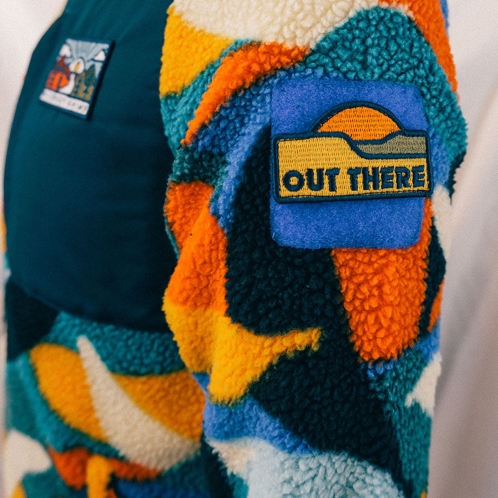 Out There Recycled Sherpa Fleece (Banana Camo Forest/Orange)