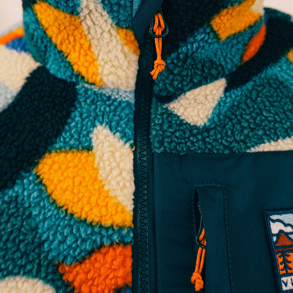 Out There Recycled Sherpa Fleece (Banana Camo Forest/Orange)