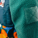 Out There Hooded Recycled Sherpa Fleece Jacket (Banana Camo Forest/Orange)