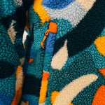 Out There Recycled Sherpa Fleece (Banana Camo Forest/Orange)