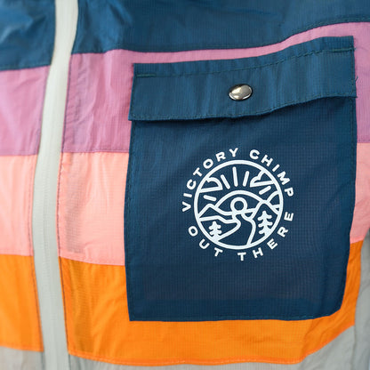 Out There Unisex Packable Rain Jacket (Sunset)